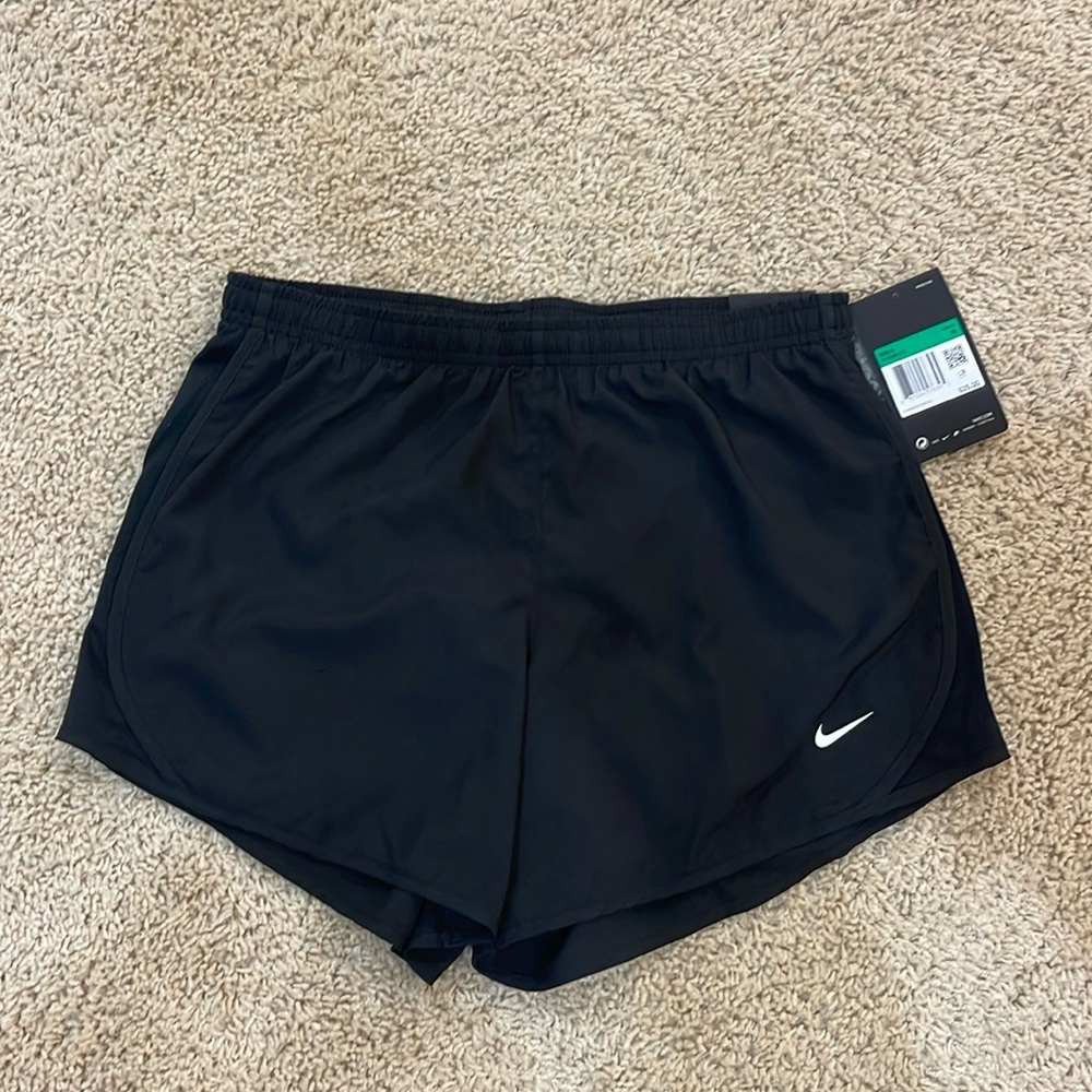 Black Nike shorts; size: girls XL